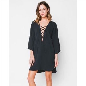 Black bell sleeve dress w/ tie in front